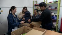 Trabajadores de TPS, Ultraport y Sitrans donaron útiles escolares a niños del Barrio Puerto.