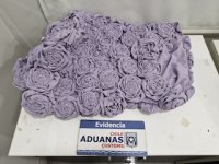 En vestido con flores ocultaron cocaína para intentar enviarla a Australia